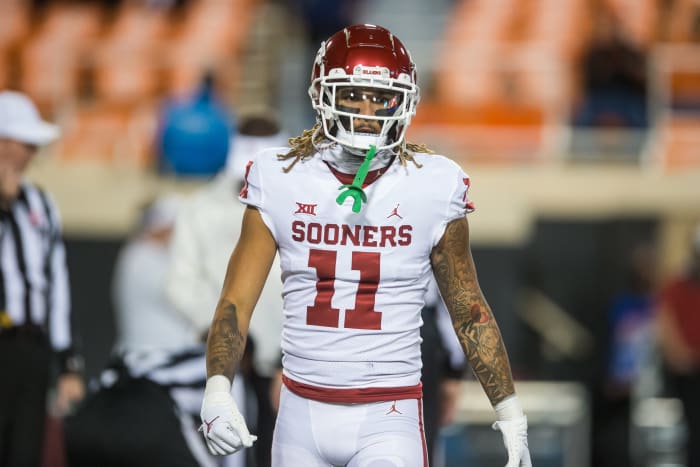 Oklahoma Sooners wide receiver Jadon Haselwood (11) warms up before the game against the Oklahoma State Cowboys at Boone Pickens Stadium. Oklahoma State Cowboys won 37-33.